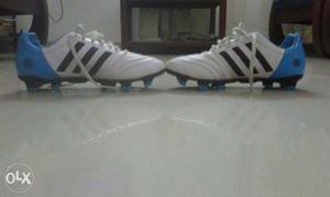 Newly not used yet Pair Of White-blue-and-black Adidas boots