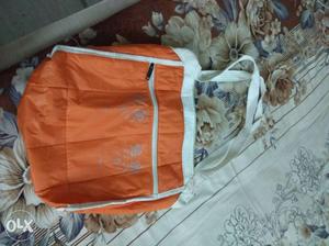 Orange color shopping bag