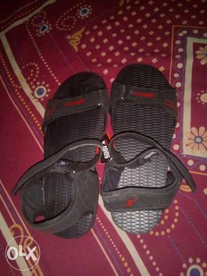 Pair Of Black Sandals