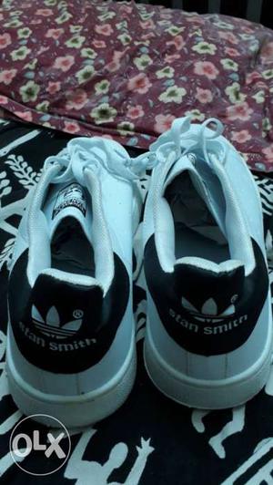 Pair Of White-and-black Adidas Stan Smith Sneakers