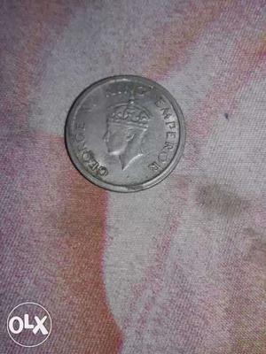 Round Male Profile Silver Coin