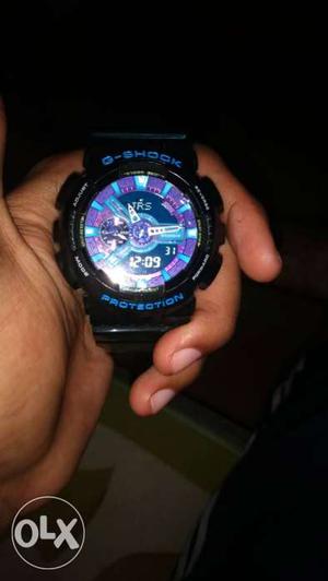 Round Purple G-Shock Chronograph Watch With Black Strap