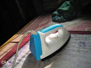 White And Blue Electronic Iron