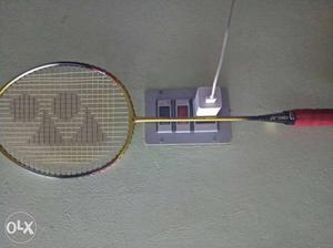 Yellow, Red, And Black Badminton Racket