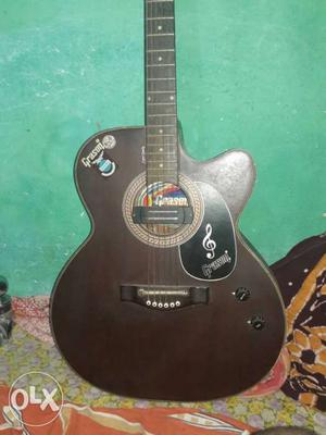 3 months used grason guitar