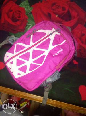 Baby pink colour foxstar school bag with a bottle