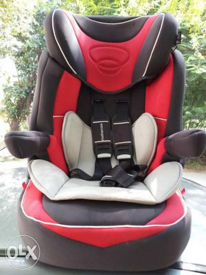 Baby's Black And Red Booster Seat