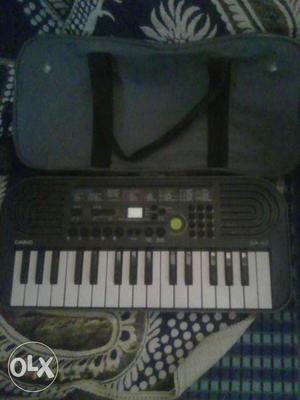 Casio (A very cool device,just like a piano)with its cover