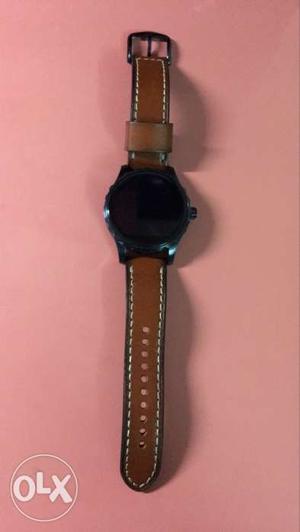 Fossil q marshall brown strap watch.