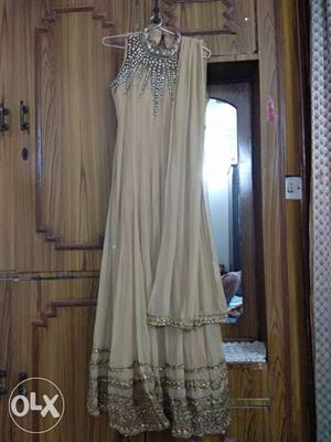 Light Brown colored full length traditional suit