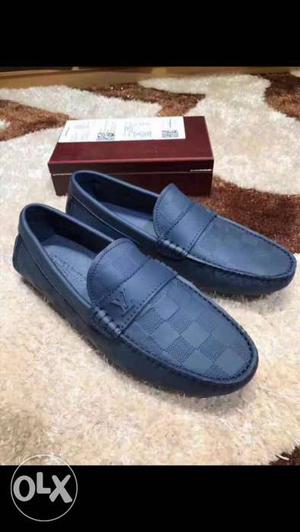 Pair Of Blue Leather Loafers