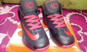 Pair Of Red-and-black KD Basketball Shoes