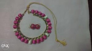 Pink beaded thread set with earring