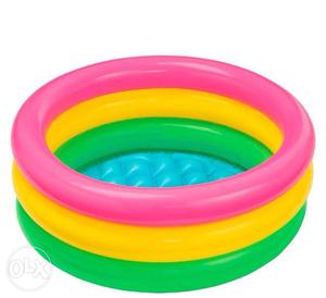 Round Pink, Yellow, And Green Inflatable Pool