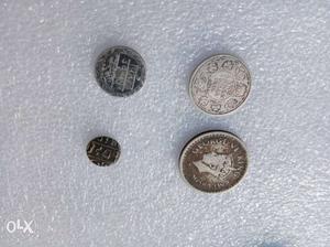 (Silver coins) Antique and vintage four silver coins.