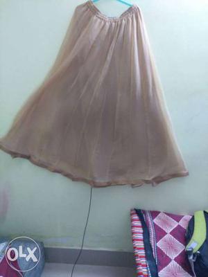 The long off-whie long skirt.The skirt used used