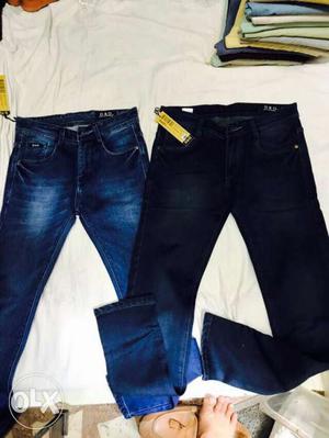 Two Blue And Black Denim Pants