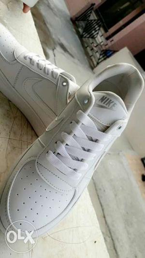 White Nike Air Force Low Top Sneakers