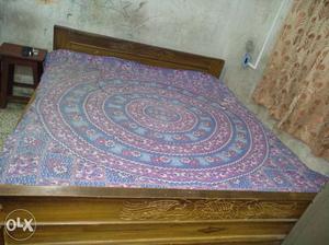 6ft/7ft wooden bed. Still using in house. In a