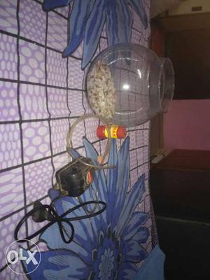 A New Aquarium Jar With Oxygen, Fish Food And