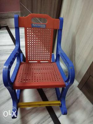 Blue And Red Plastic Rocking Chair