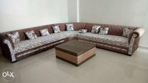 Brown And White Floral Sectional Sofa With Throw Pillows
