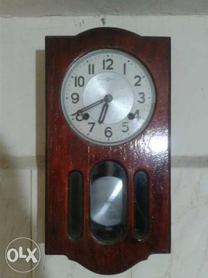 Brown Pendulum Clock
