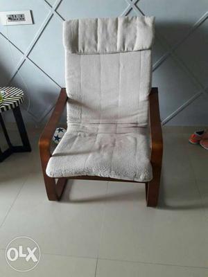 Brown Wooden Framed Gray Padded Armchair