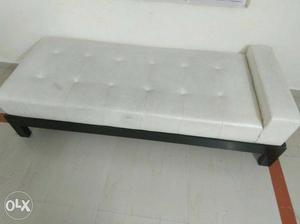Couch with white mattress