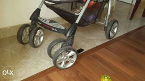 Gray And Black Sit And Stand Stroller