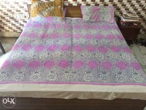 Gray And Pink Floral Bedspread With Two Pillows