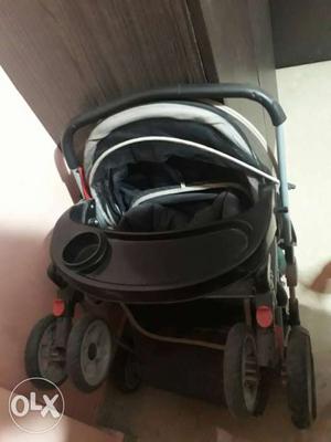 Pram in excellent condition and branded.(H&H)