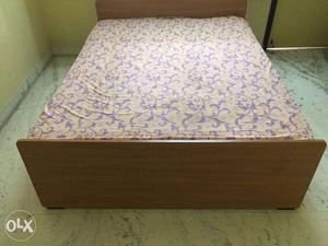 Queen size wooden bed with Springwell foam mattress