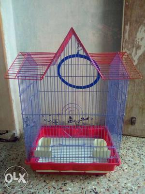 Red And Blue Metal Birdcage