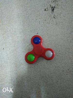 Red, Blue, And Yellow Fidget Tri-spinner