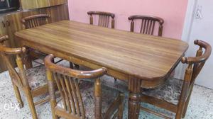 Selling used Dinning table with 6 chairs