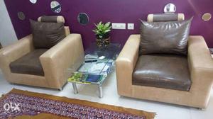 Two Brown Padded Sofa Chairs