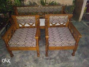 Two Brown Wooden Framed Gray Padded Sofa Chairs