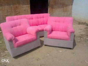 Two Pink And Gray Armchairs And Couch