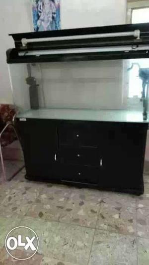 Used fish tank with 3ft width 4 ft height with cabinet.