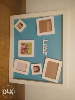 Wooden photo frame with 6 magnetic frames of
