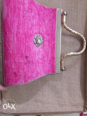 Awsome bridal purses pink colour golden handing