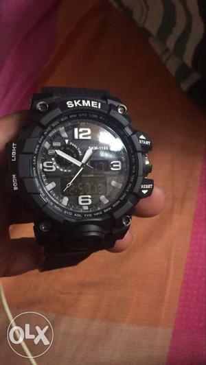 Black digital monolouge watch with 1 yr