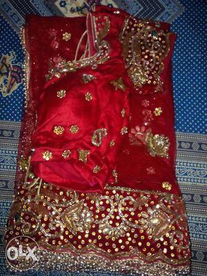 Brand new Red color bridal lehenga for sale at reasonable