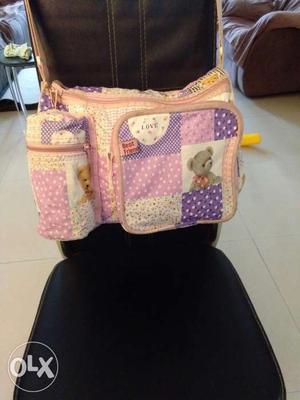 Diaper bag with pockets for bottles, almost new.
