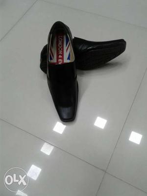 Men's Pair Of Black Leather Slip-on Dress Shoe