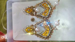 Pair Of Diamond Embellished Silver Earrings