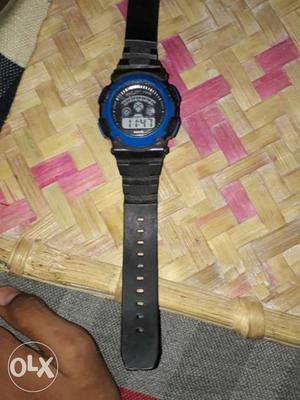 Round Blue And Black Digital Watch