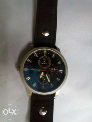 Round Blue And Silver Face Chronograph Watch With Black