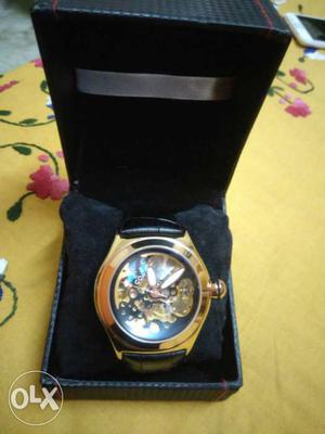 Round Gold And Black Skeleton Watch With Leather Band And